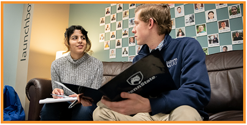 Interns in conversation; showing the story image crop for 600 x 300 pixels