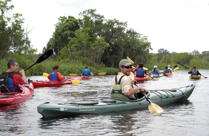 =Student in the Wilderness class paddling a canoe